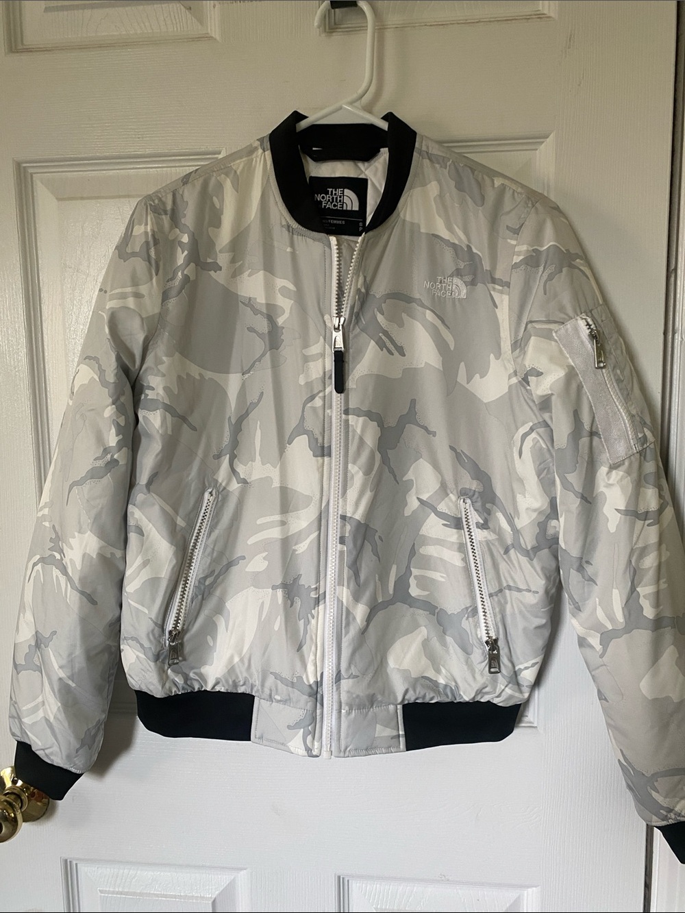 The North Face White & Light Gray Camo Jacket with Black Trim.